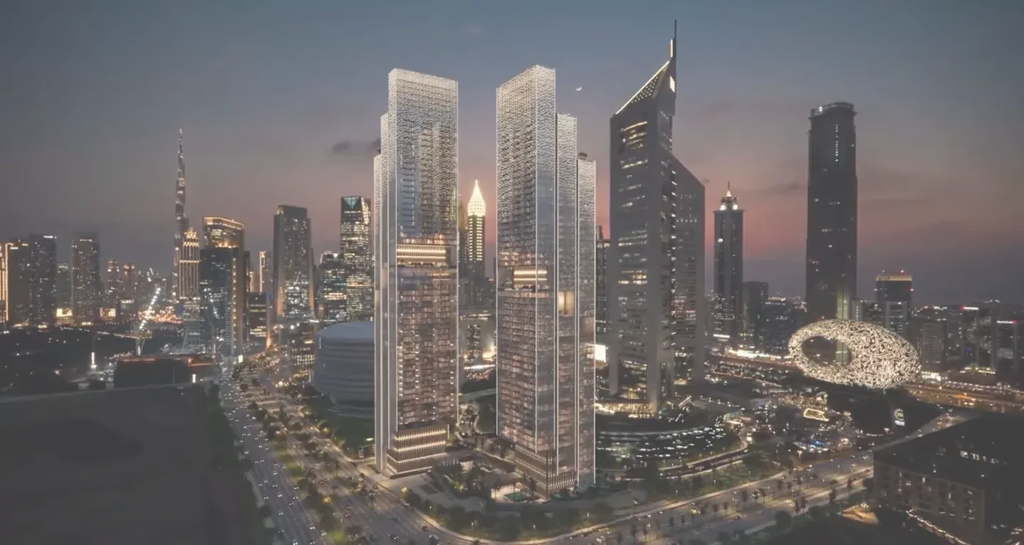 Jumeirah Residences Emirates Towers on the Sheikh Zayed Road skyline at night
