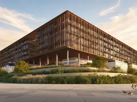 The Yards Plaza at golden hour, with timber-toned louvres above landscaped gardens